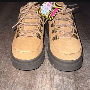 Brown sketchers shoes